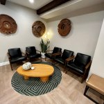 Chairs and Table in the Waiting Area at Fountaingrove Dentistry