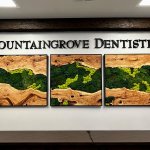 Fountaingrove Dentistry signage with art below it.